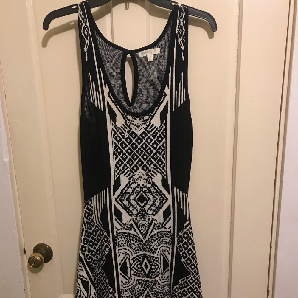 Black and white knit sweater dress in geometric pattern